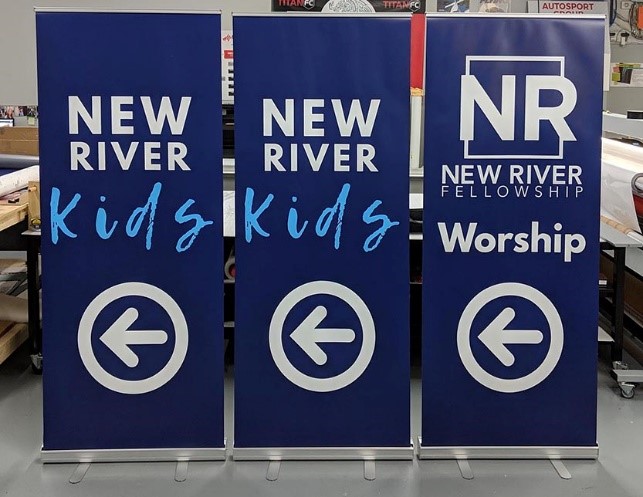 Fabric vs. Vinyl vs. Hard-Panel: Trade Show Backdrop Materials Comparison